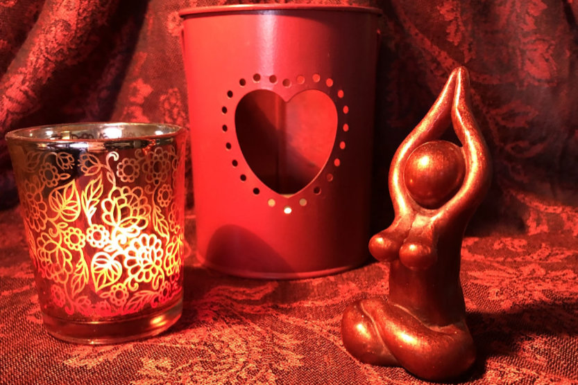 Candles and a goddess sculpture