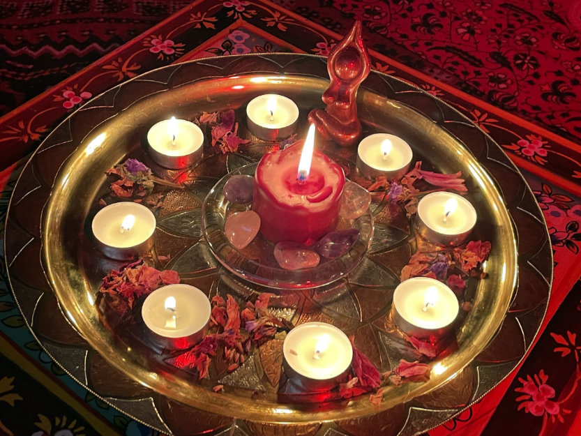 An arragenment of candles and crystals